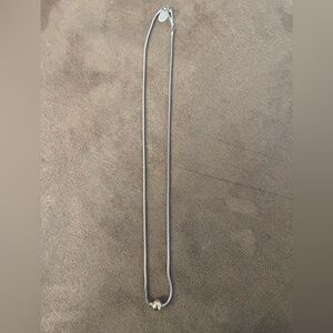 Elegant Silver Necklace with Gold Accent